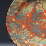 Falling Leaves. Available in 8 and 12 inch plates or 10 inch bowl.<br>Shown with terracotta background, also available with olive or black background.