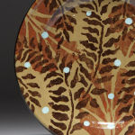 Falling Leaves . Available in 8 and 12 inch plates or 10 inch bowl. Shown with Olive background, also available with olive or black background.