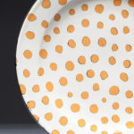 Tiny Dots White. Available in 8 and 12 inch plates or 10 inch bowl.